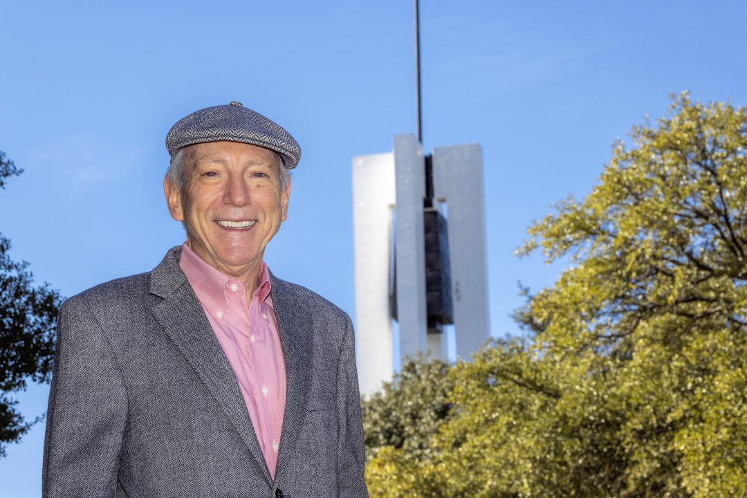 History Professor Larry Story, pictured in front of TCC South's iconic Carillon, retires from Tarrant County College after 58 1/2 semesters.